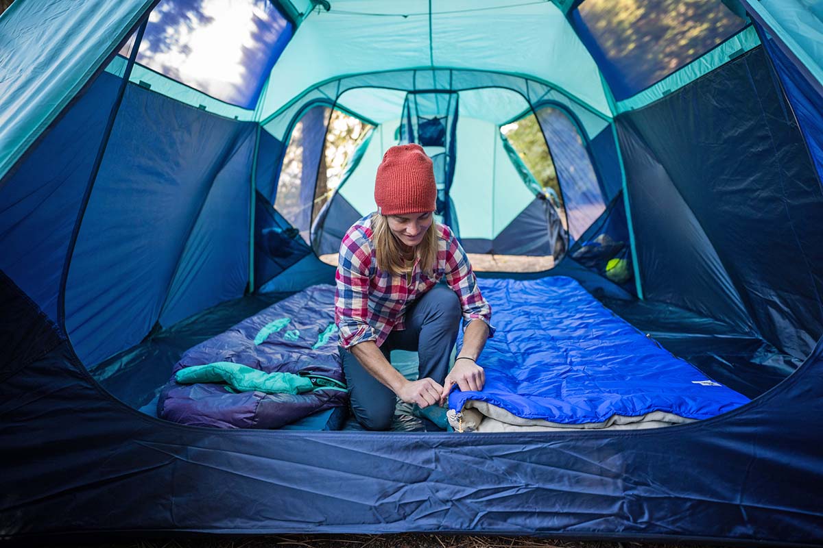 Setting up sleeping bag in The North Face Wawona camping tent